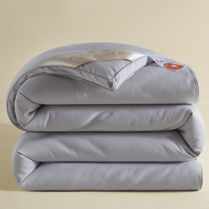 91家纺网 家纺一手货源 找家纺 置顶家纺 2024新款贡缎提花大豆纤维被子被芯--棚拍图 串串格-经典灰