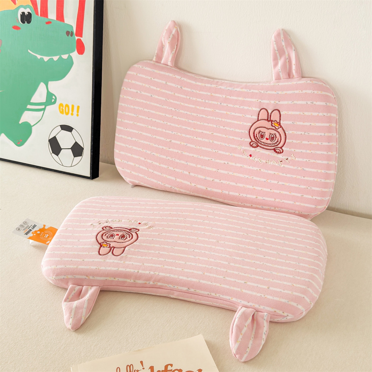 91家纺网 家纺一手货源 找家纺 麦肯锡 2025新款卡通刺绣婴童记忆枕  枕头枕芯 粉色/对