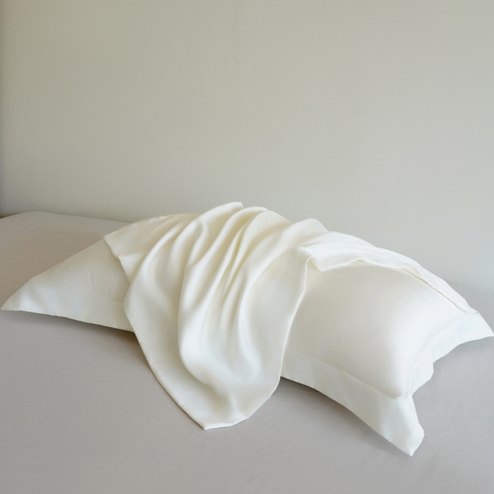 91家纺网 家纺一手货源 找家纺 凯森家纺 兰精天丝枕套一对100%莱赛尔枕头套凉感天丝枕芯套夏季冰丝整套48x74cm丝滑裸睡 100%莱赛尔天丝-奶油白