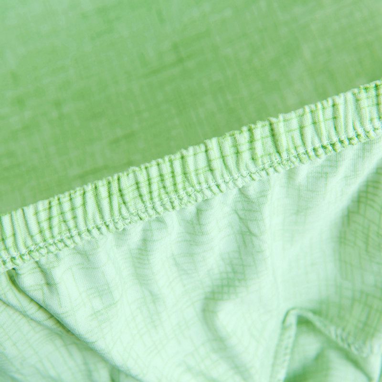 91家纺网 家纺一手货源 找家纺 壹零特色家纺 2025新款印花款实木多人沙发椅套 亚麻纹草绿