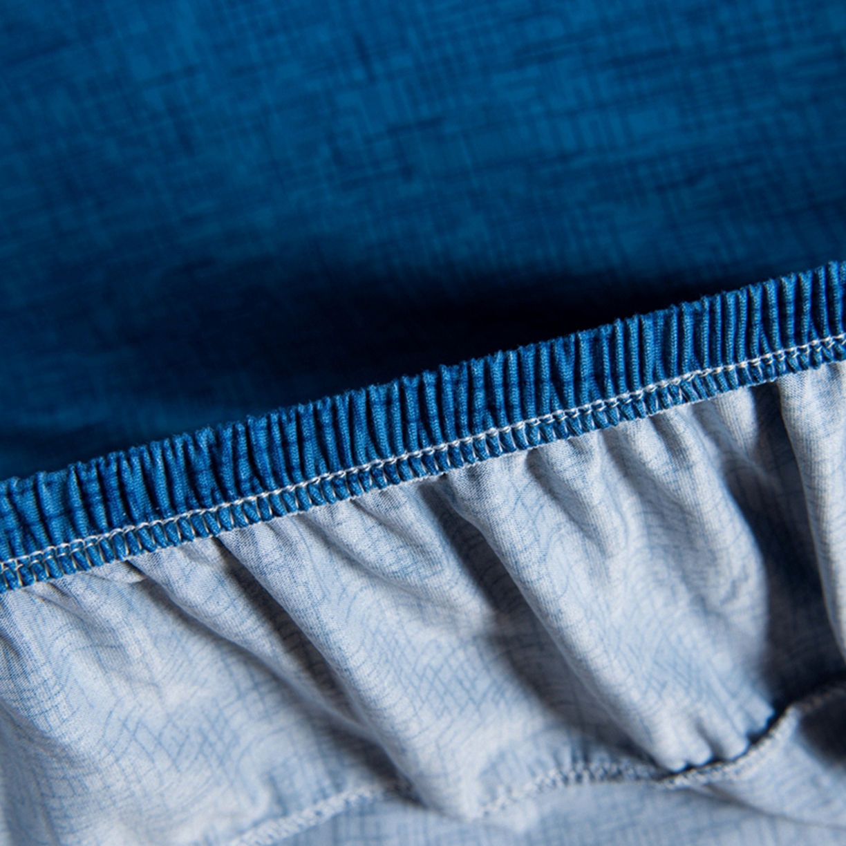 91家纺网 家纺一手货源 找家纺 壹零特色家纺 2025新款印花款实木多人沙发椅套 亚麻纹深蓝