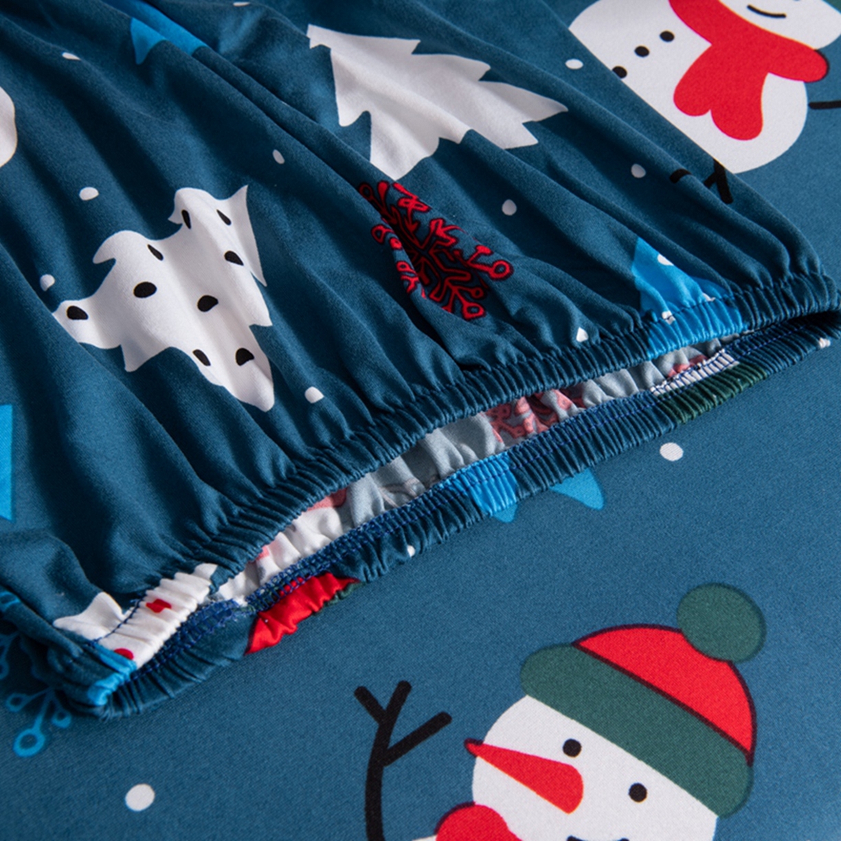 91家纺网 家纺一手货源 找家纺 壹零特色家纺 2025新款印花款实木多人沙发椅套 快乐圣诞-蓝