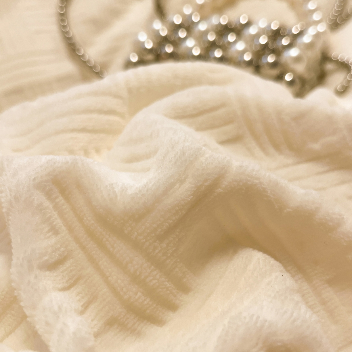 91家纺网 家纺一手货源 找家纺 如一 2025新款3D雕花牛奶绒单被套 编织纹-白橘