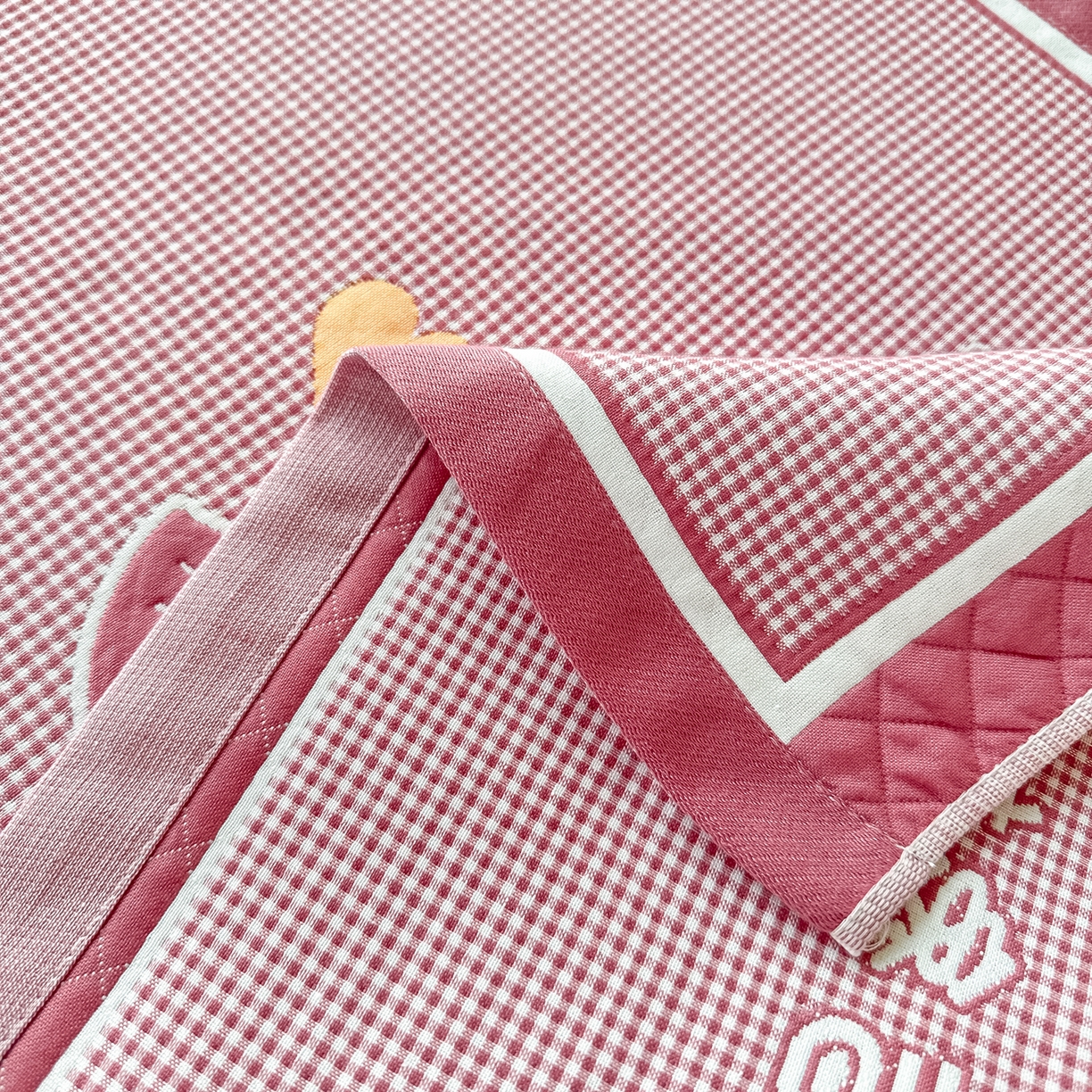 91家纺网 家纺一手货源 找家纺 沐瑟家纺 2025新款亲肤柔软纱布小米格枕巾 小象-粉 52*78cm枕巾/对