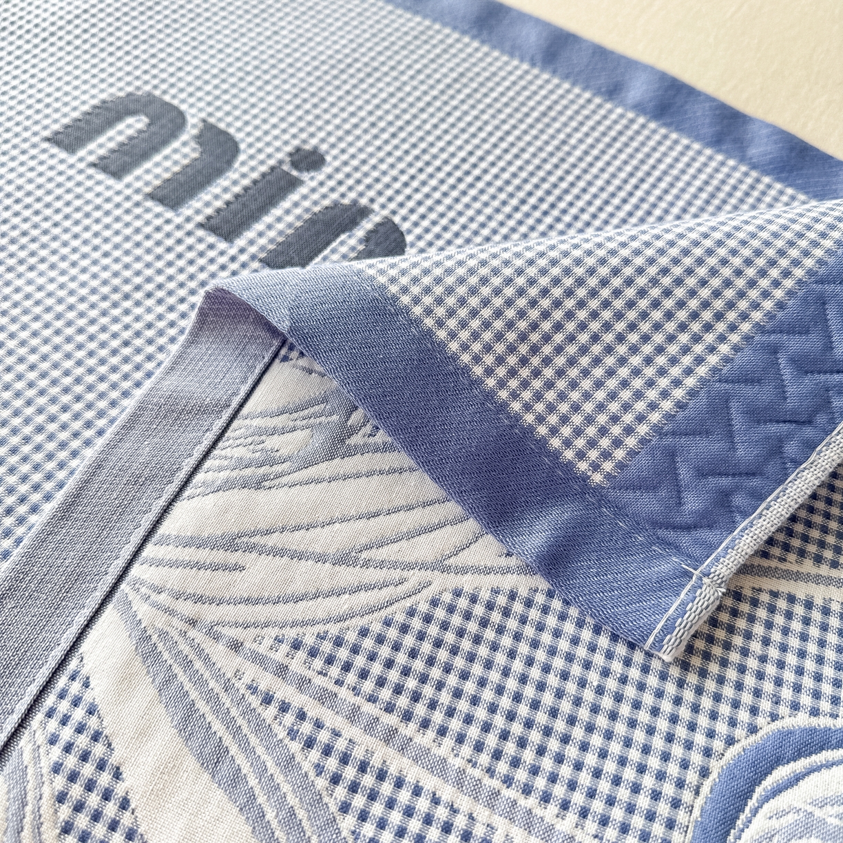 91家纺网 家纺一手货源 找家纺 沐瑟家纺 2025新款亲肤柔软纱布小米格枕巾 郁金香-蓝色 52*78cm枕巾/只