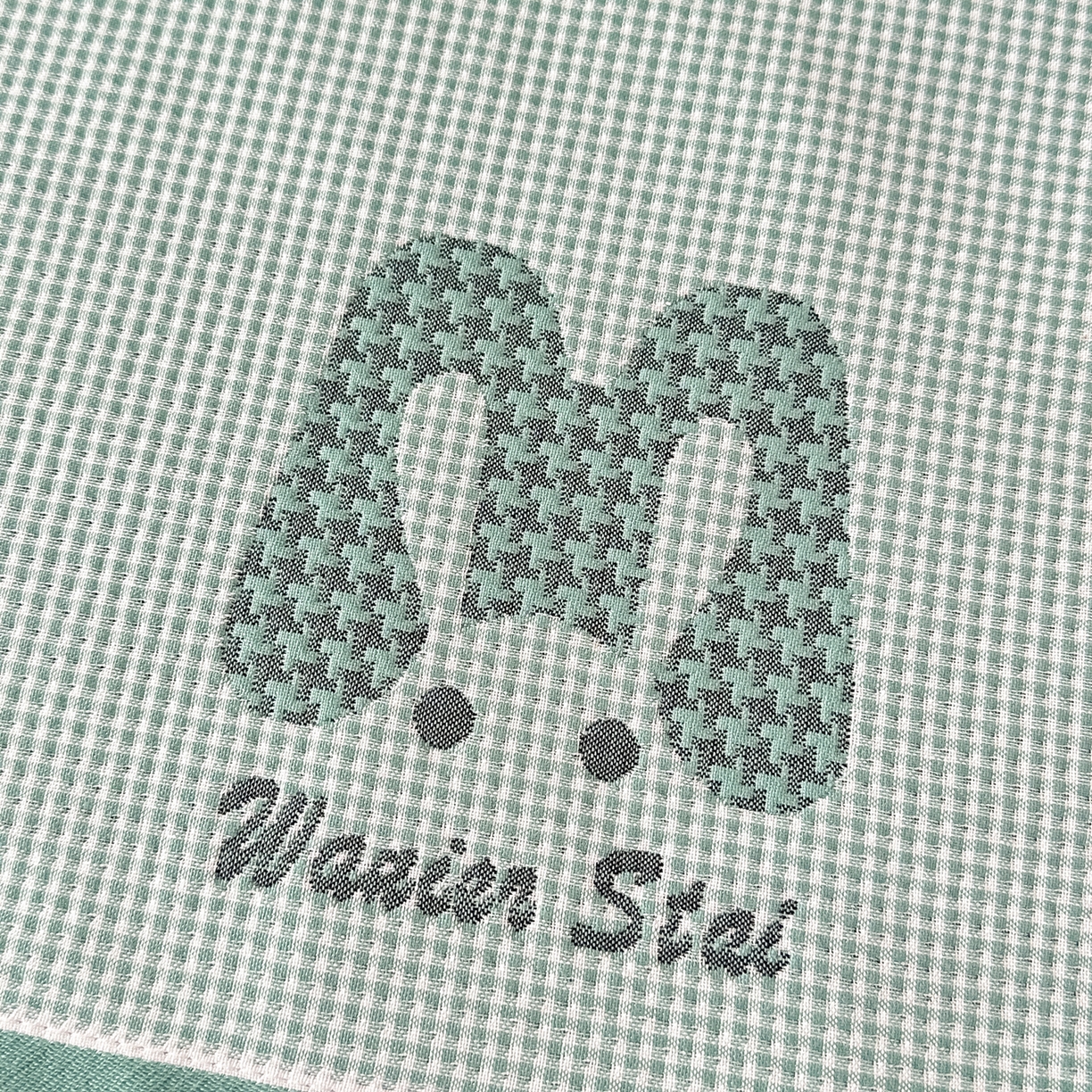 91家纺网 家纺一手货源 找家纺 沐瑟家纺 2025新款亲肤柔软纱布小米格枕巾 M兔-绿色 52*78cm枕巾/对