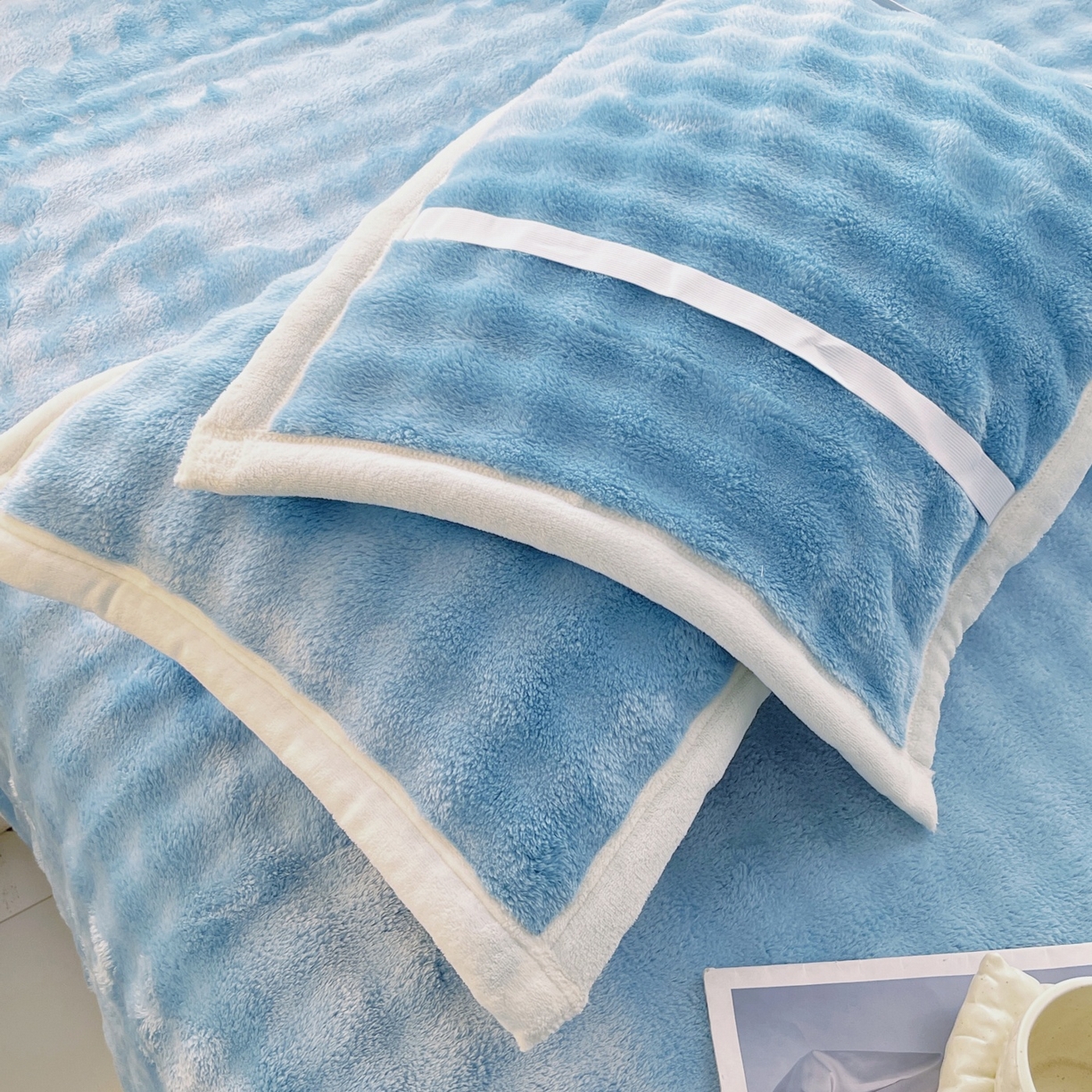 91家纺网 家纺一手货源 找家纺 雨彤家纺 2025新款泡泡牛奶绒单人枕巾 牛奶绒枕巾-天空蓝 50*80cm（一对）