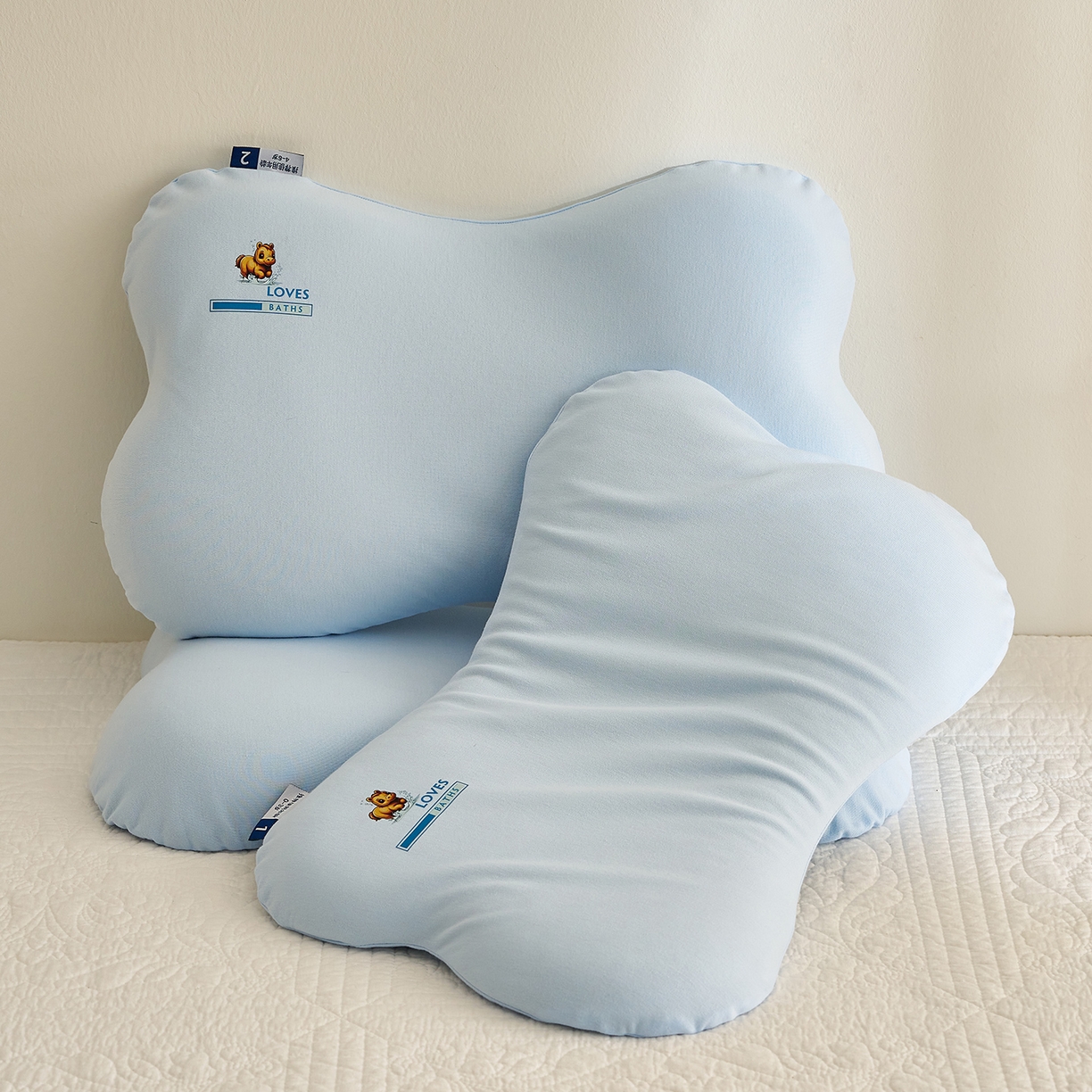 91家纺网 家纺一手货源 找家纺 乐可 2025新款蝶形儿童硅胶枕婴童学生枕头枕芯 蝶形儿童硅胶枕-蓝-G3 35*55*8cm/只