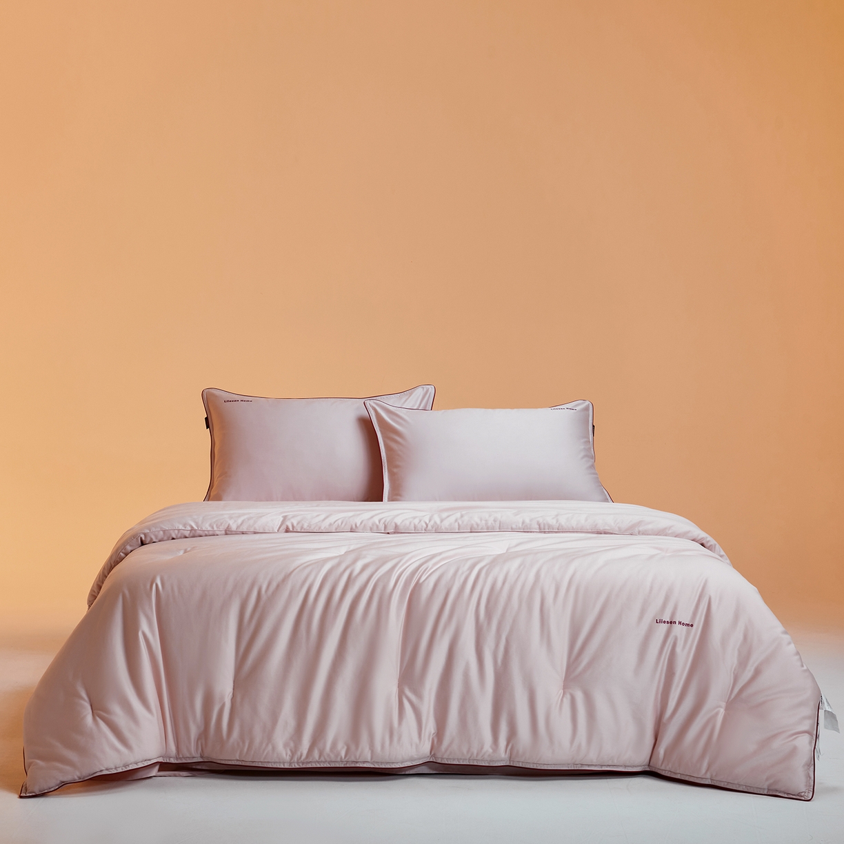 91家纺网 家纺一手货源 找家纺 丽笙被芯 2025新款秋冬亲肤舒适80S超细旦天丝棉微磨毛素色可水洗懒人被-场景一 日光粉