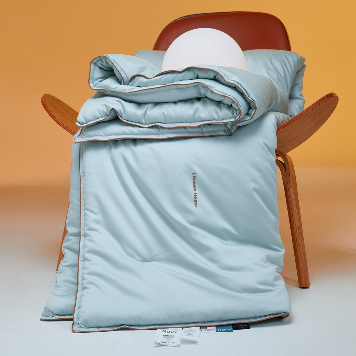 91家纺网 家纺一手货源 找家纺 丽笙被芯 2025新款秋冬亲肤舒适80S超细旦天丝棉微磨毛素色可水洗懒人被-场景一 陶瓷蓝
