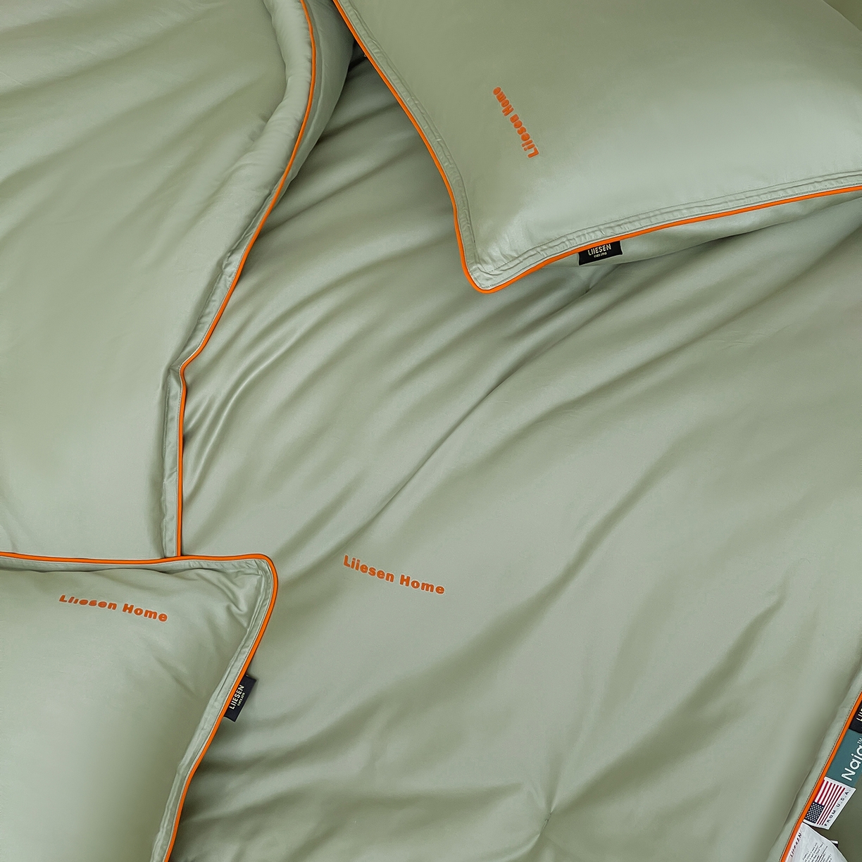 91家纺网 家纺一手货源 找家纺 丽笙被芯 2025新款秋冬亲肤舒适80S超细旦天丝棉微磨毛素色可水洗懒人被-场景二 香松绿