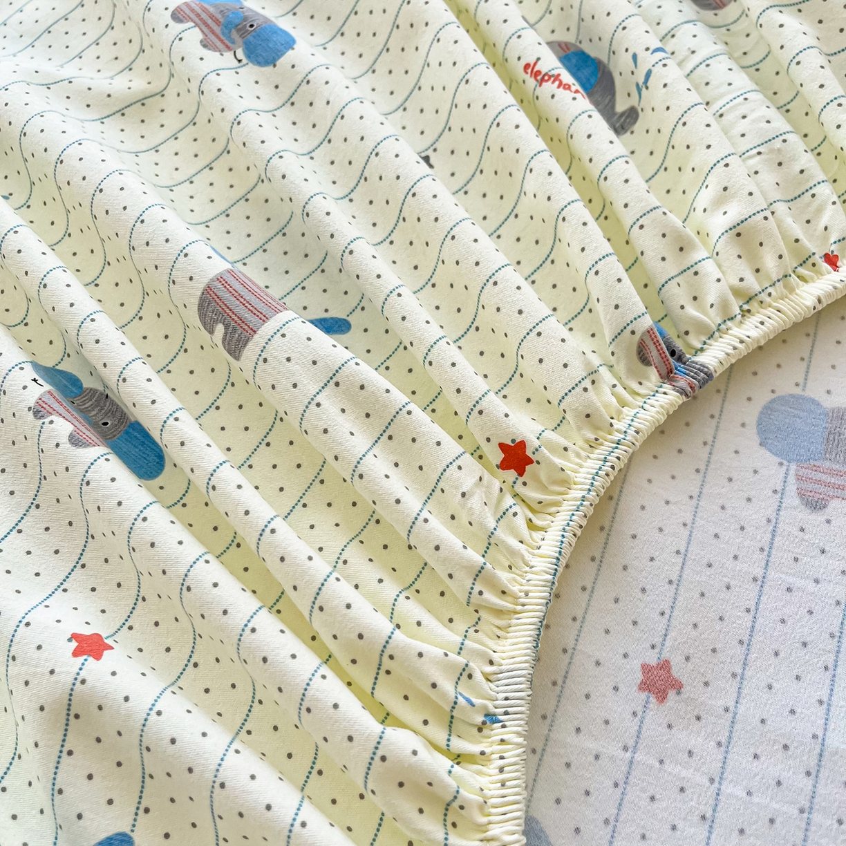 91家纺网 家纺一手货源 找家纺 棉乐町家居 2025新款木棉双层纱印花床笠 点点象