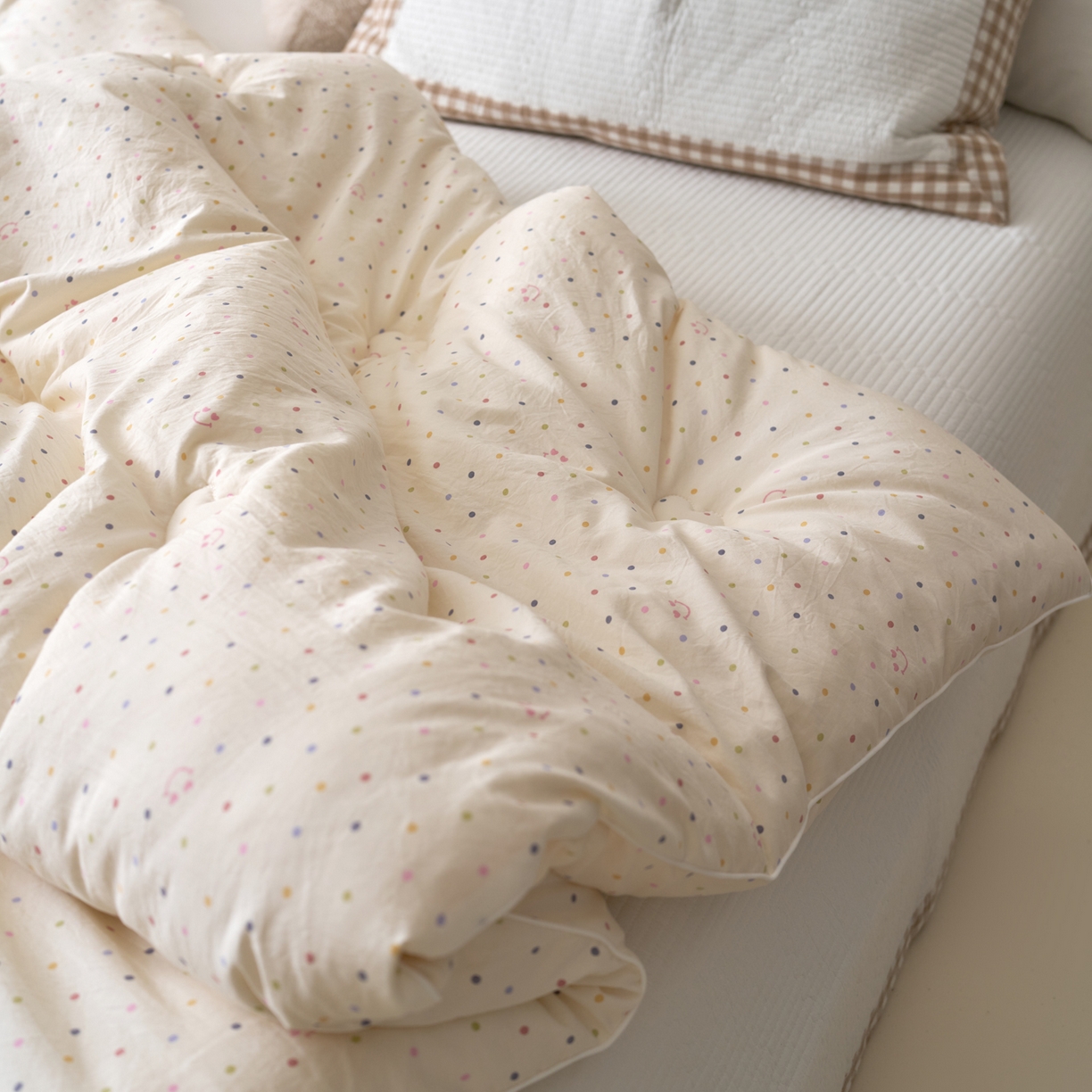 91家纺网 家纺一手货源 找家纺 久典家居 2025新款云糯棉印花大豆被被子被芯 笑脸