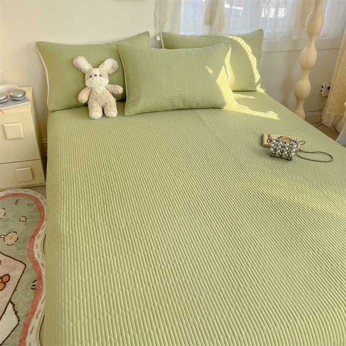 91家纺网 家纺一手货源 找家纺 妮可 2025新款热款花型印花全棉夹棉多功能床垫-床盖 发芽绿