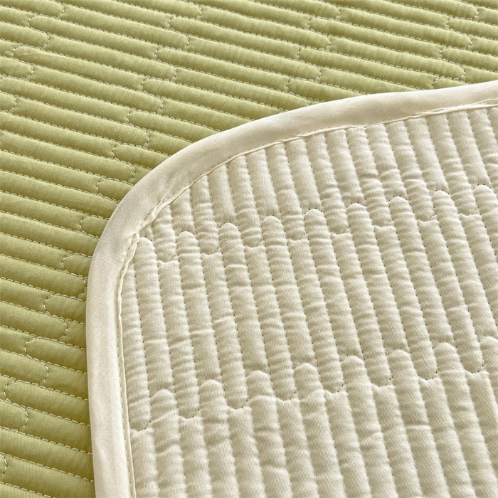 91家纺网 家纺一手货源 找家纺 妮可 2025新款热款花型印花全棉夹棉多功能床垫-床盖 发芽绿