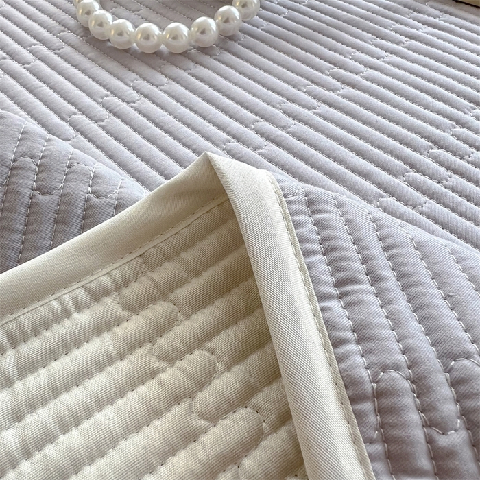 91家纺网 家纺一手货源 找家纺 妮可 2025新款热款花型印花全棉夹棉多功能床垫-床盖 绅士灰