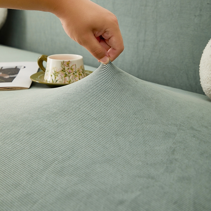 91家纺网 家纺一手货源 找家纺 丝绮鹿 2025新款灯芯绒系列沙发套-竖条-裙摆 青绿