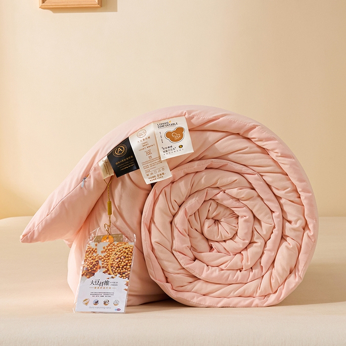 91家纺网 家纺一手货源 找家纺 娇逸家居 2025新款云朵棉软糯糯纯色小鲜豆被被子被芯 小鲜豆粉