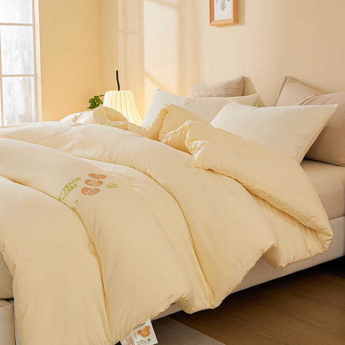 91家纺网 家纺一手货源 找家纺 娇逸家居 2025新款云朵棉软糯糯纯色小鲜豆被被子被芯 小鲜豆米