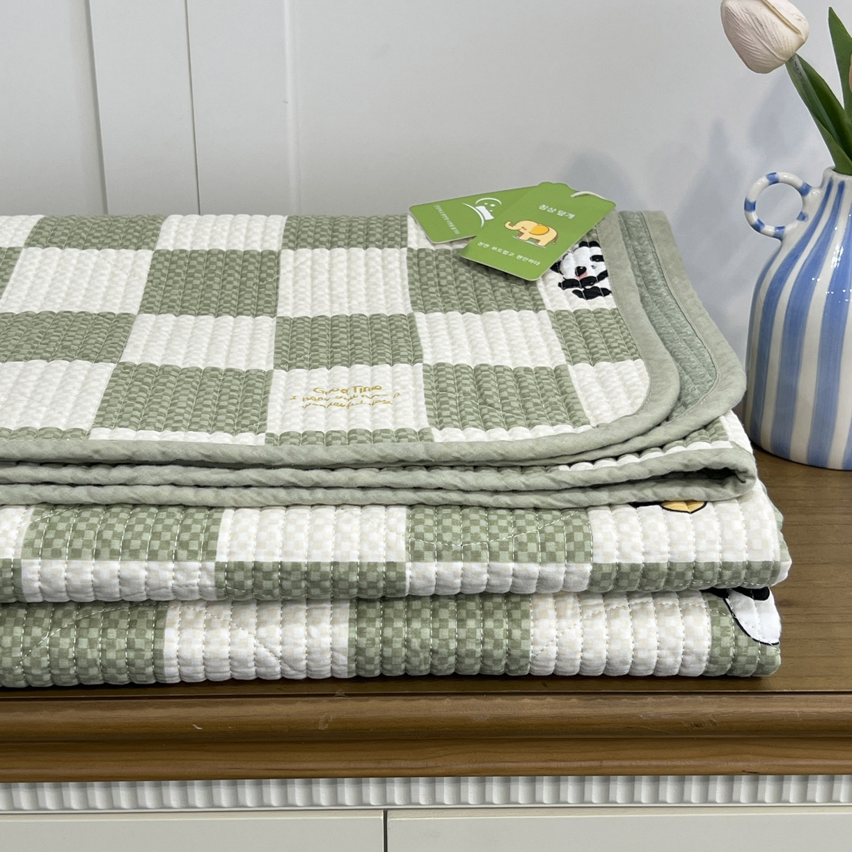 91家纺网 家纺一手货源 找家纺 沐纯家居 2025新款跑量款双面纯棉 棉花填充水洗床盖 绿格熊猫