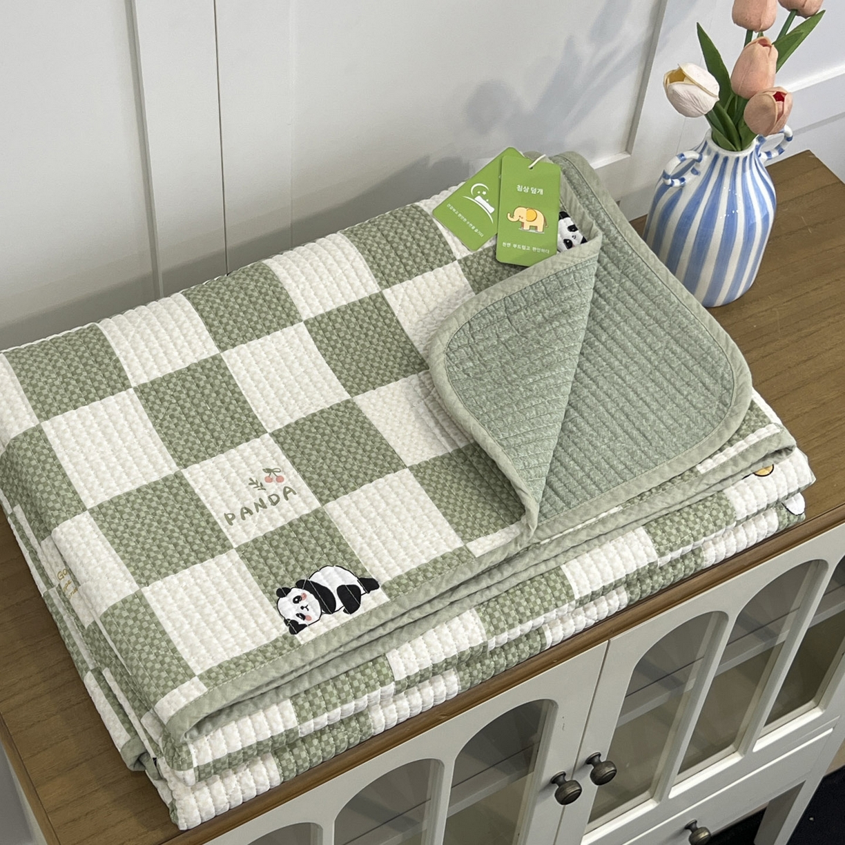 91家纺网 家纺一手货源 找家纺 沐纯家居 2025新款跑量款双面纯棉 棉花填充水洗床盖 绿格熊猫