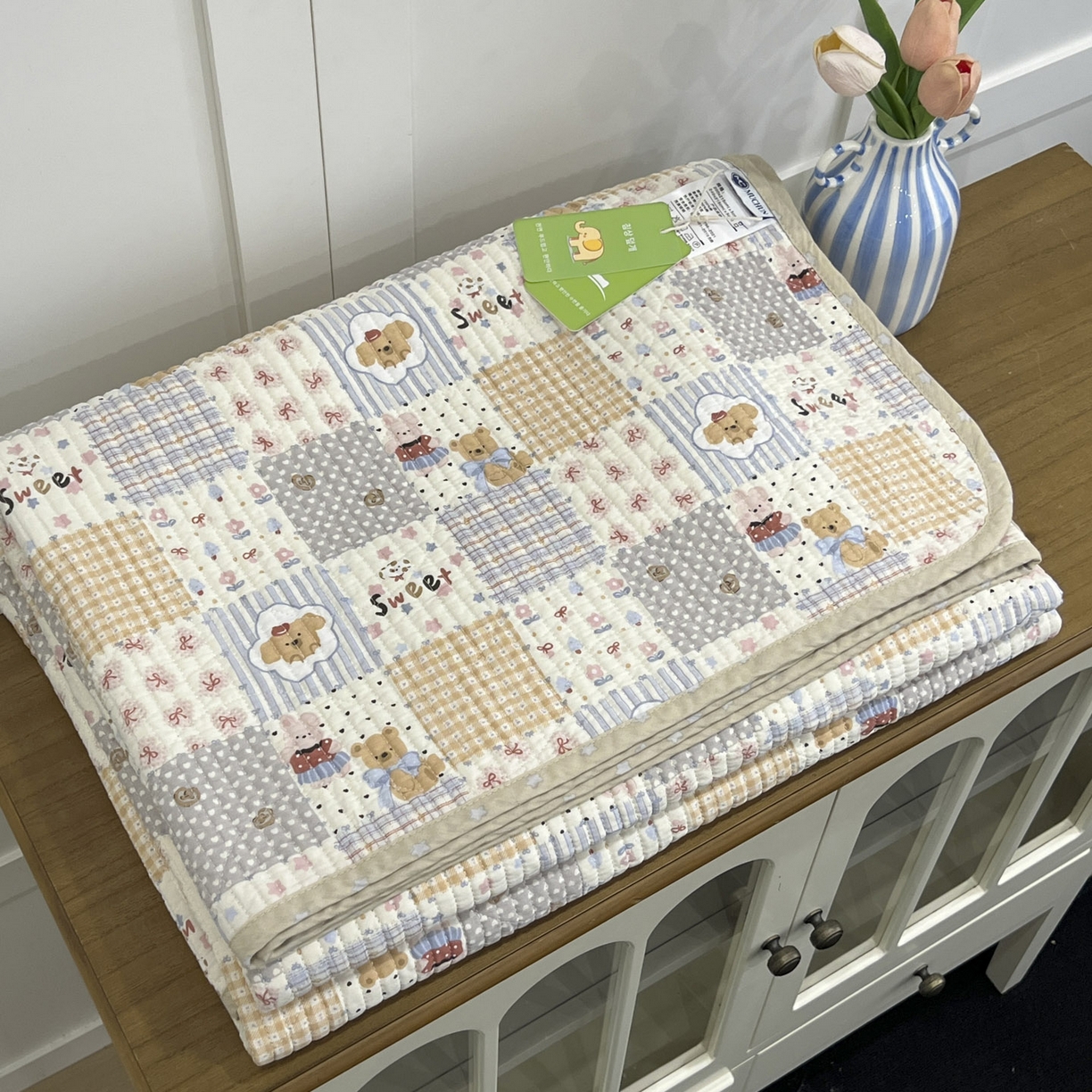 91家纺网 家纺一手货源 找家纺 沐纯家居 2025新款跑量款双面纯棉 棉花填充水洗床盖 拼格小熊