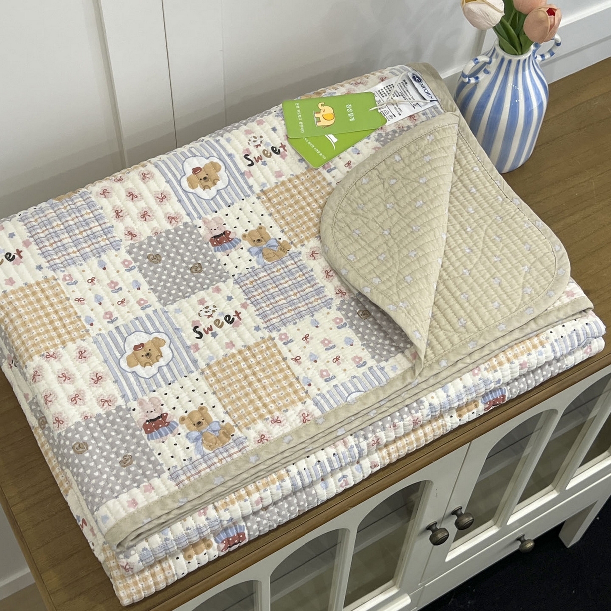 91家纺网 家纺一手货源 找家纺 沐纯家居 2025新款跑量款双面纯棉 棉花填充水洗床盖 拼格小熊