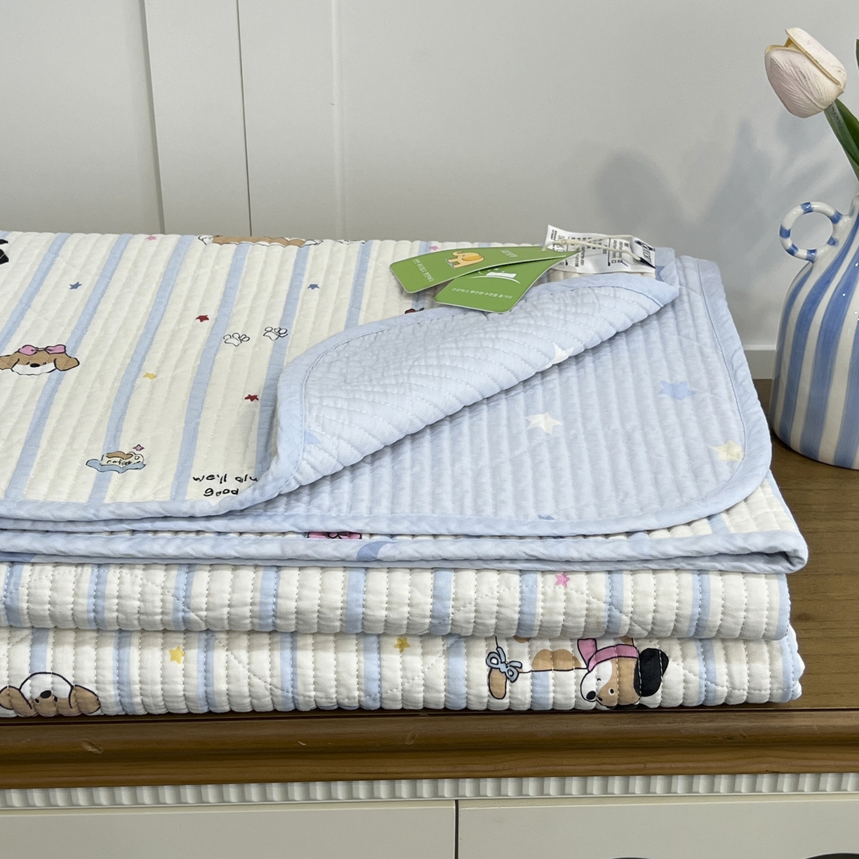 91家纺网 家纺一手货源 找家纺 沐纯家居 2025新款跑量款双面纯棉 棉花填充水洗床盖 条纹萌犬