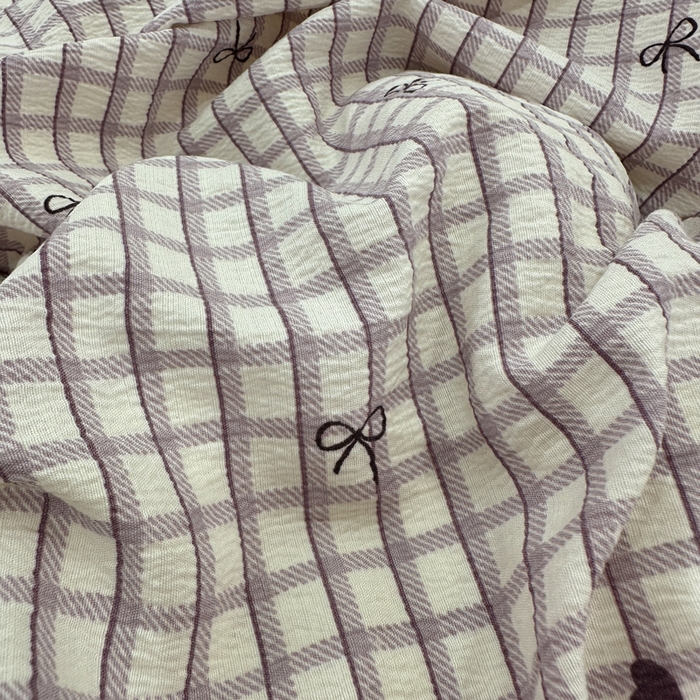 91家纺网 家纺一手货源 找家纺 仟网汇 2025新款保暖舒适棉加绒四件套 格子蝴蝶结紫