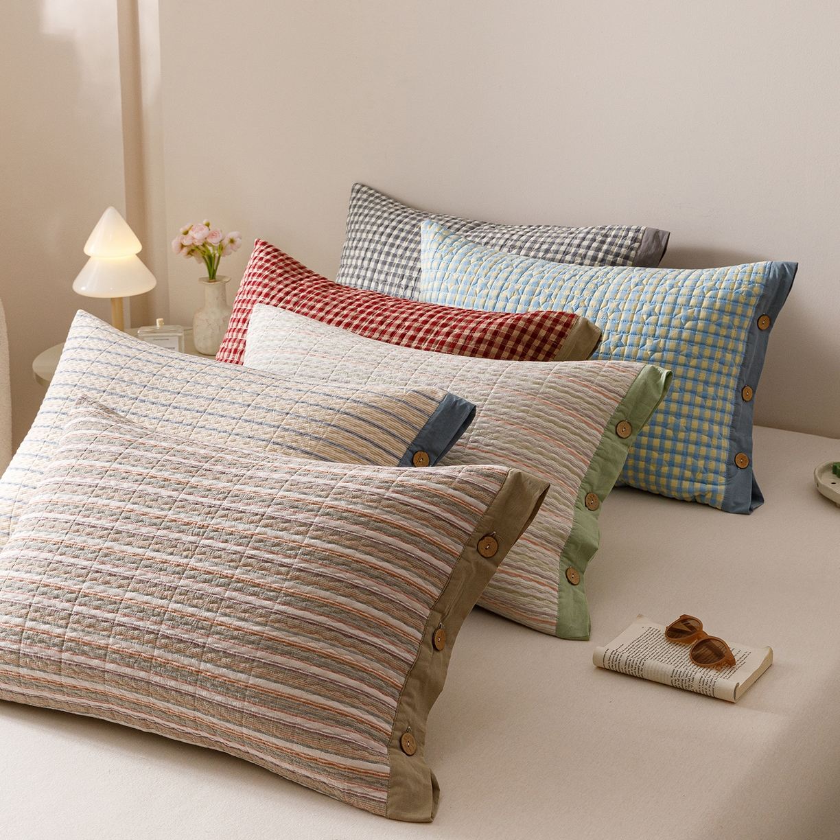 91家纺网 家纺一手货源 找家纺 爱港家纺 2025新款全棉色织水洗加厚绗缝夹棉防头油双面枕头套单品枕套单件枕套 组合图仅供参考不可下单