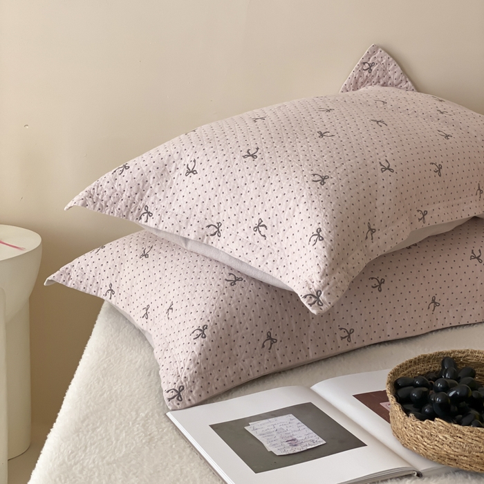91家纺网 家纺一手货源 找家纺 麻依 2025新款安心棉枕套四层纱布枕套 点点蝴蝶结-粉