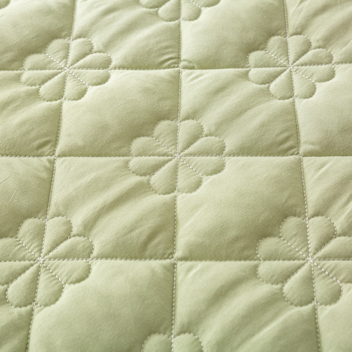 91家纺网 家纺一手货源 找家纺 恬澳家纺 2025新款简约亲肤夹棉床笠-四叶草 四叶草-豆绿