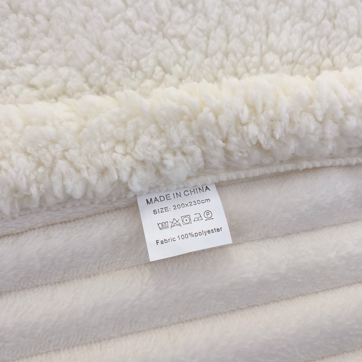 91家纺网 家纺一手货源 找家纺 枋梢家纺 2025新款仿兔毛绒大抽条羊羔绒毛毯反包双层条纹羊羔绒法兰绒毛毯跨境外贸 米白