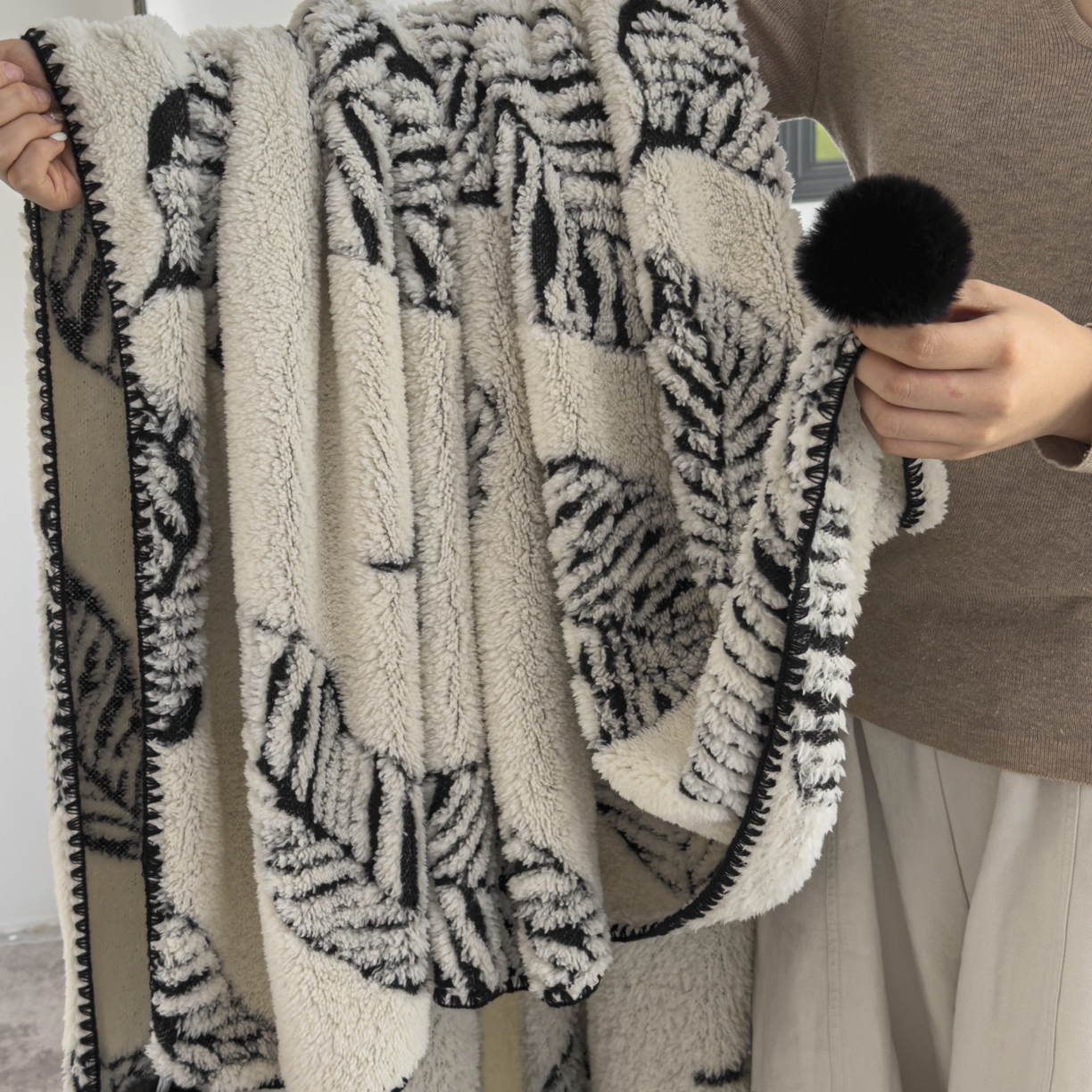 91家纺网 家纺一手货源 找家纺 潮邦创意家居 2025新款提花色织三角针工艺球毯毛毯毯子墨绒秘境 墨绒秘境系列-绒叶