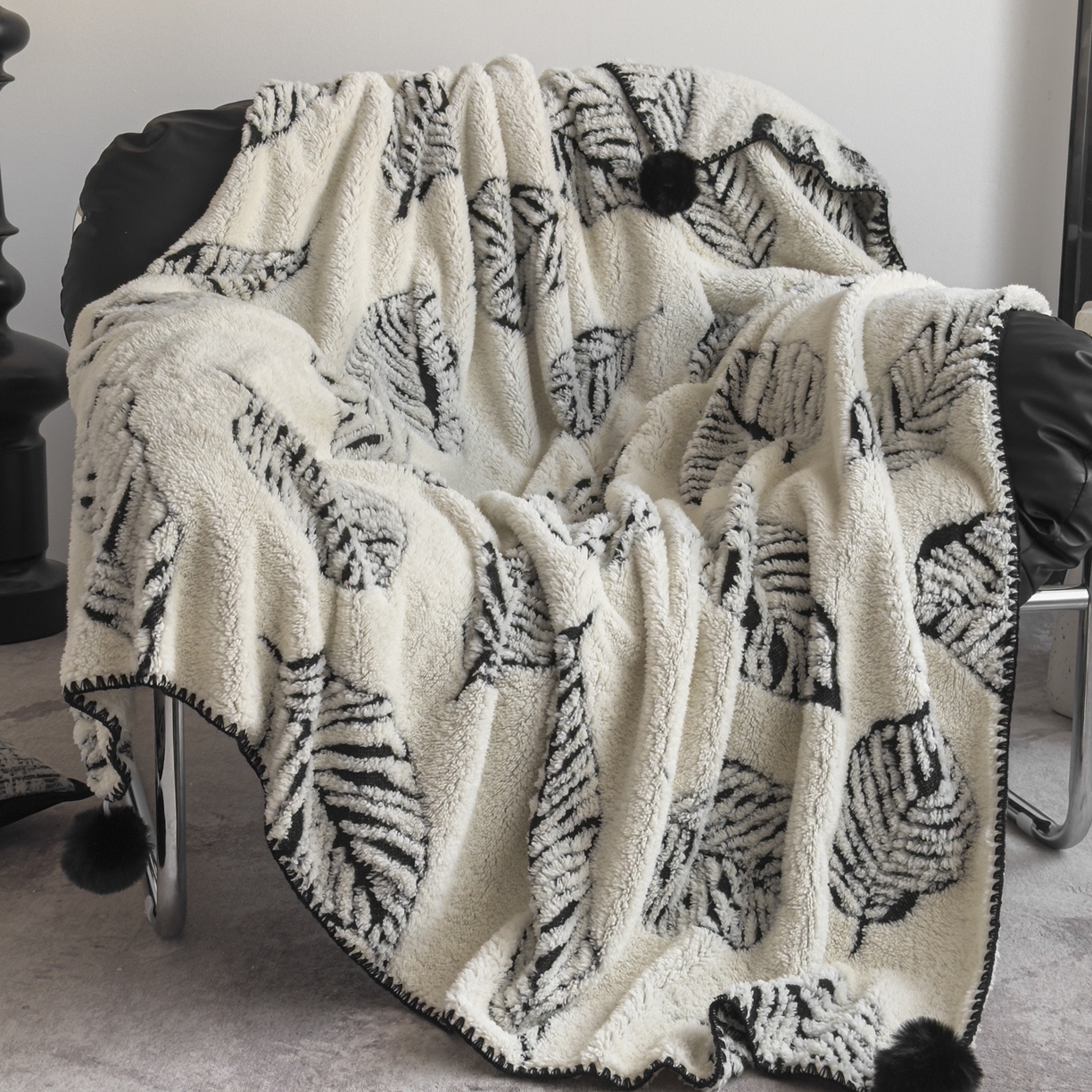 91家纺网 家纺一手货源 找家纺 潮邦创意家居 2025新款提花色织三角针工艺球毯毛毯毯子墨绒秘境 墨绒秘境系列-绒叶