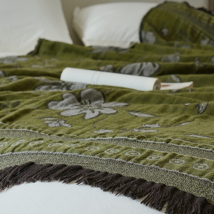 91家纺网 家纺一手货源 找家纺 子和家居 2025新款全棉色织提花毯子毛毯-墨茵 向阳生花（绿）