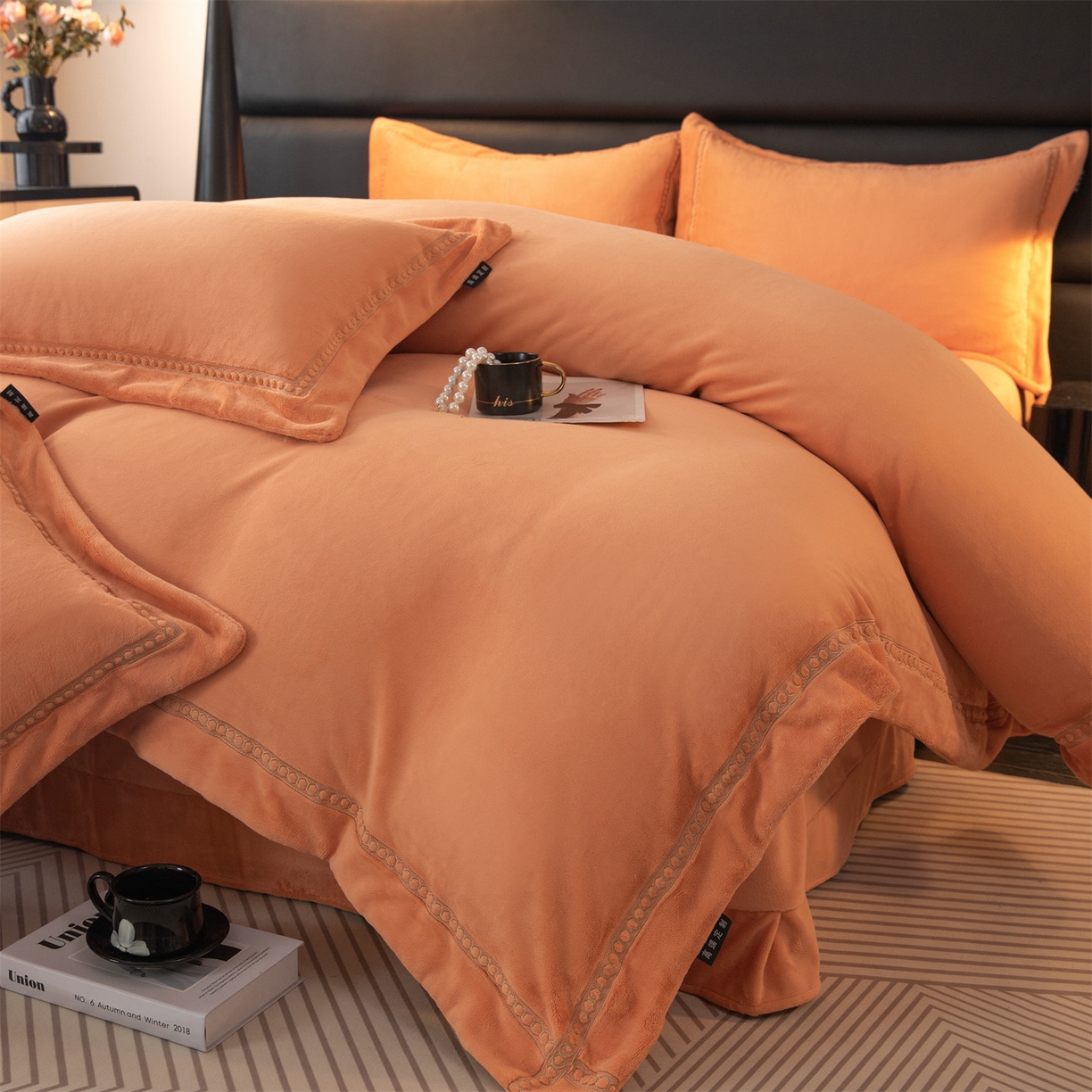 91家纺网 家纺一手货源 找家纺 暖洋家纺 2025新款暖芙绒纯色刺绣款套件四件套 爱玛橙