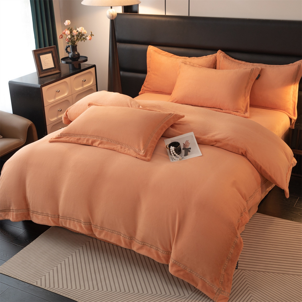 91家纺网 家纺一手货源 找家纺 暖洋家纺 2025新款暖芙绒纯色刺绣款套件四件套 爱玛橙