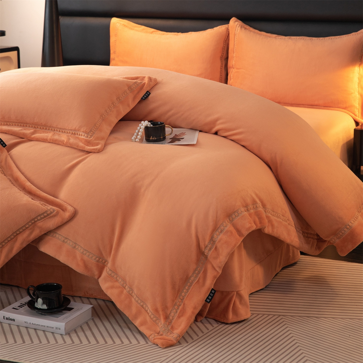 91家纺网 家纺一手货源 找家纺 暖洋家纺 2025新款暖芙绒纯色刺绣款套件四件套 爱玛橙