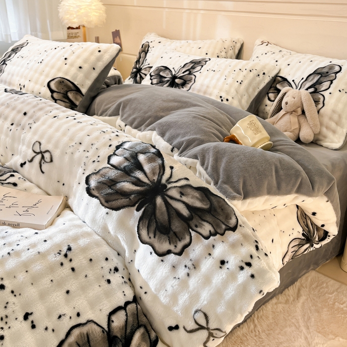 91家纺网 家纺一手货源 找家纺 柒月家居 2025新款时尚印花泡泡绒加厚保暖四件套套件 泡泡 -黑色蝴蝶