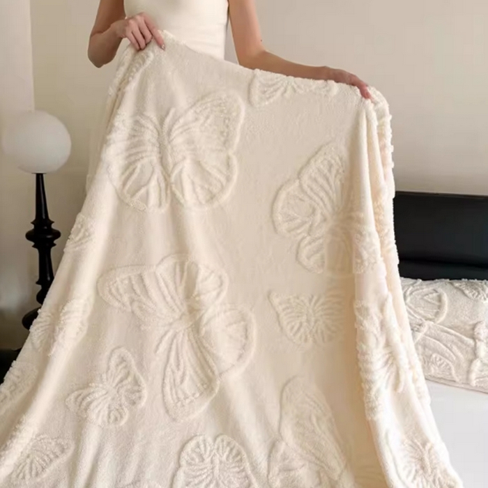 91家纺网 家纺一手货源 找家纺 喜歌家居 2025新款蝴蝶提花毯 米白色