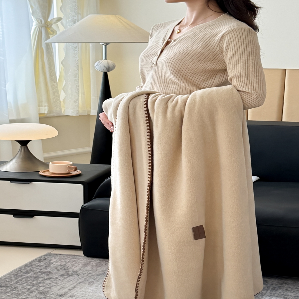 91家纺网 家纺一手货源 找家纺 金喜 2025新款双面仿羊绒多功能毯盖毯 毯子毛毯 摩卡