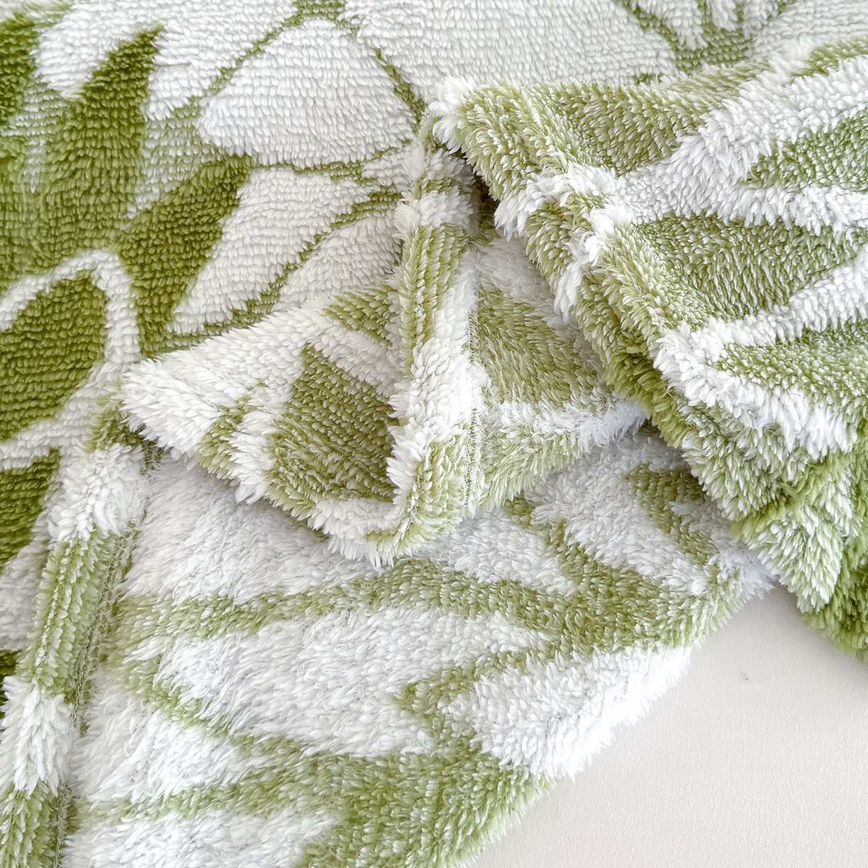 91家纺网 家纺一手货源 找家纺 枋梢家纺 2025新款万花筒阳离子提花镂空塔芙绒保暖午睡双层毛毯办公室盖毯 万花筒-浅绿