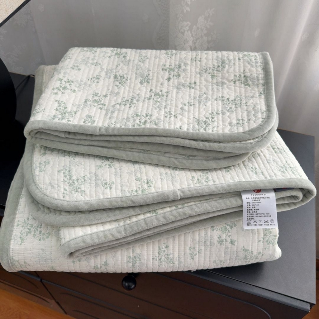 91家纺网 家纺一手货源 找家纺 暖居 2026新款一面纯棉一面绒床盖+同款纯棉豆豆被跑量 森系绿野