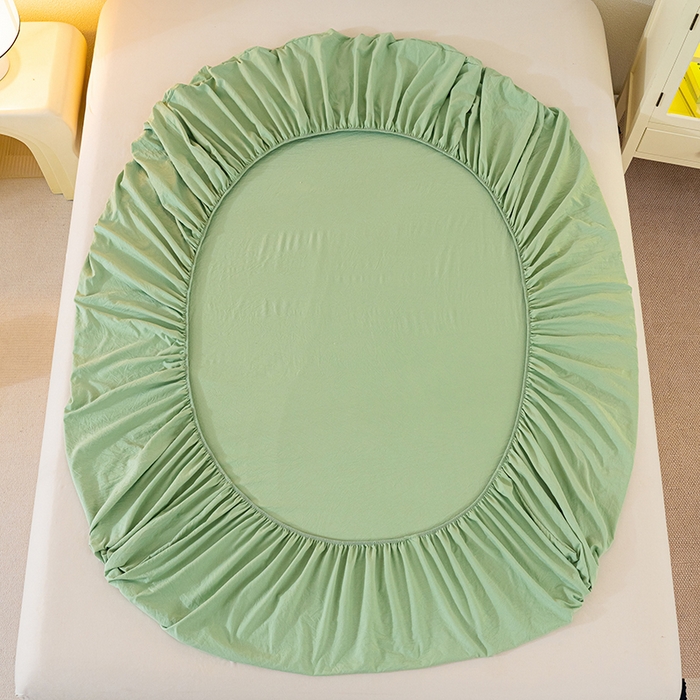 91家纺网 家纺一手货源 找家纺 桔禾家纺 2025新款水洗皱皱云感棉纯色床笠 苹果绿