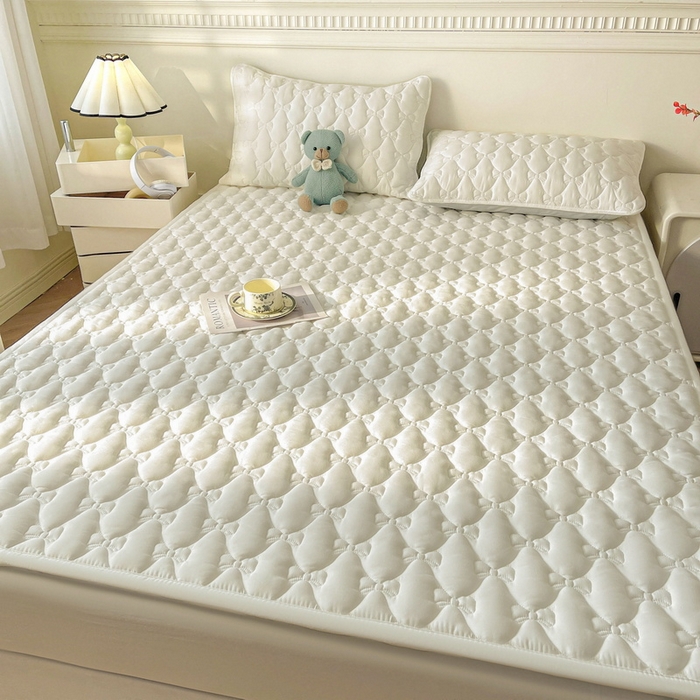 91家纺网 家纺一手货源 找家纺 LIFE.丽芙 2025新款水洗原棉单件蝴蝶结绗缝夹棉床褥垫子三件套 蝴蝶结床褥垫-奶昔白