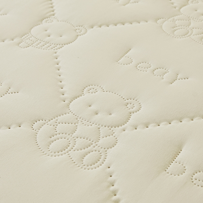 91家纺网 家纺一手货源 找家纺 LIFE.丽芙 2025新款磨毛超声波夹棉防水枕套机包边款 小熊防水夹棉枕套-奶昔白