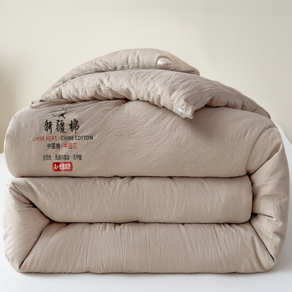 91家纺网 家纺一手货源 找家纺 尊妙被业2025新款新疆棉花被被子被芯冬被春秋被垫被二合一字母被 可可棕