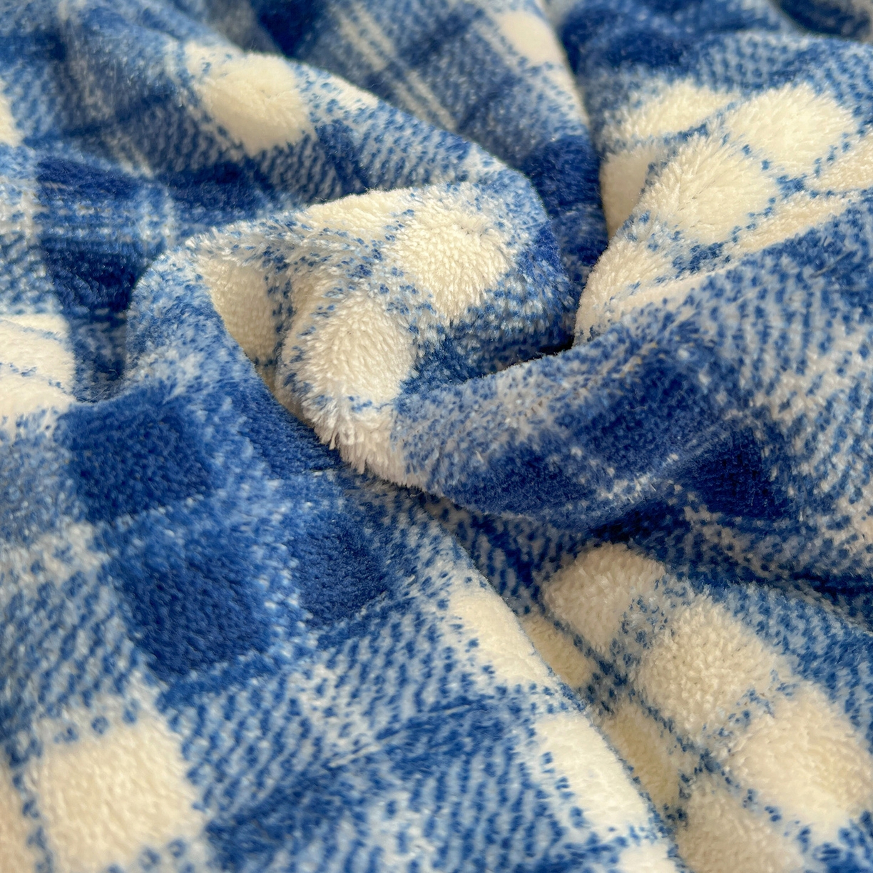 91家纺网 家纺一手货源 找家纺 Mata蔓塔家 2025新款高克重印花牛奶绒软绵绵豆豆被春秋冬被被子被芯 蓝格英伦熊（提供买家秀）