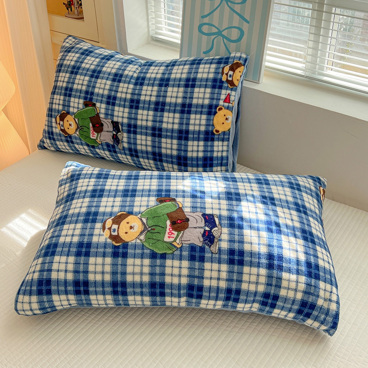 91家纺网 家纺一手货源 找家纺 Mata蔓塔家 2025新款高克重印花牛奶绒软绵绵豆豆被春秋冬被被子被芯 蓝格英伦熊（提供买家秀）